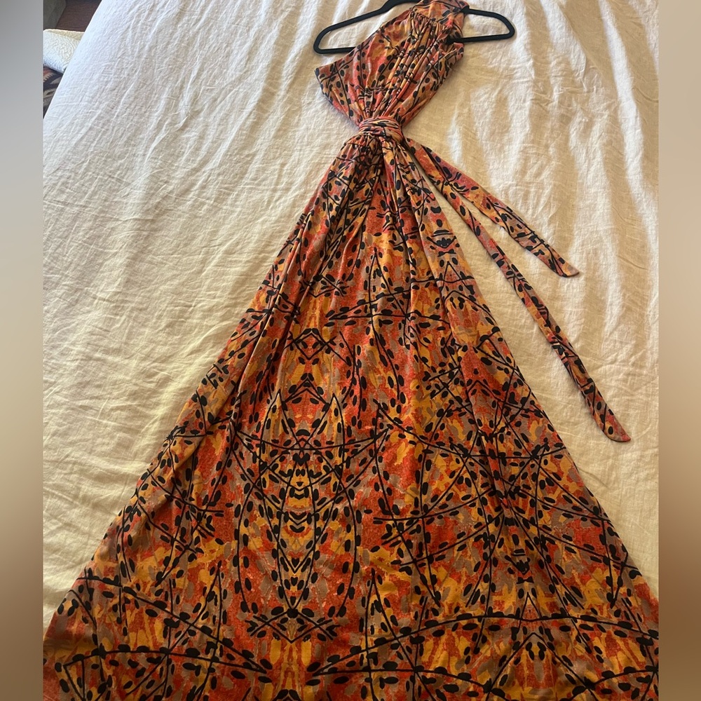 Size 6 long maxi dress. Tan, orange, gold and black print.